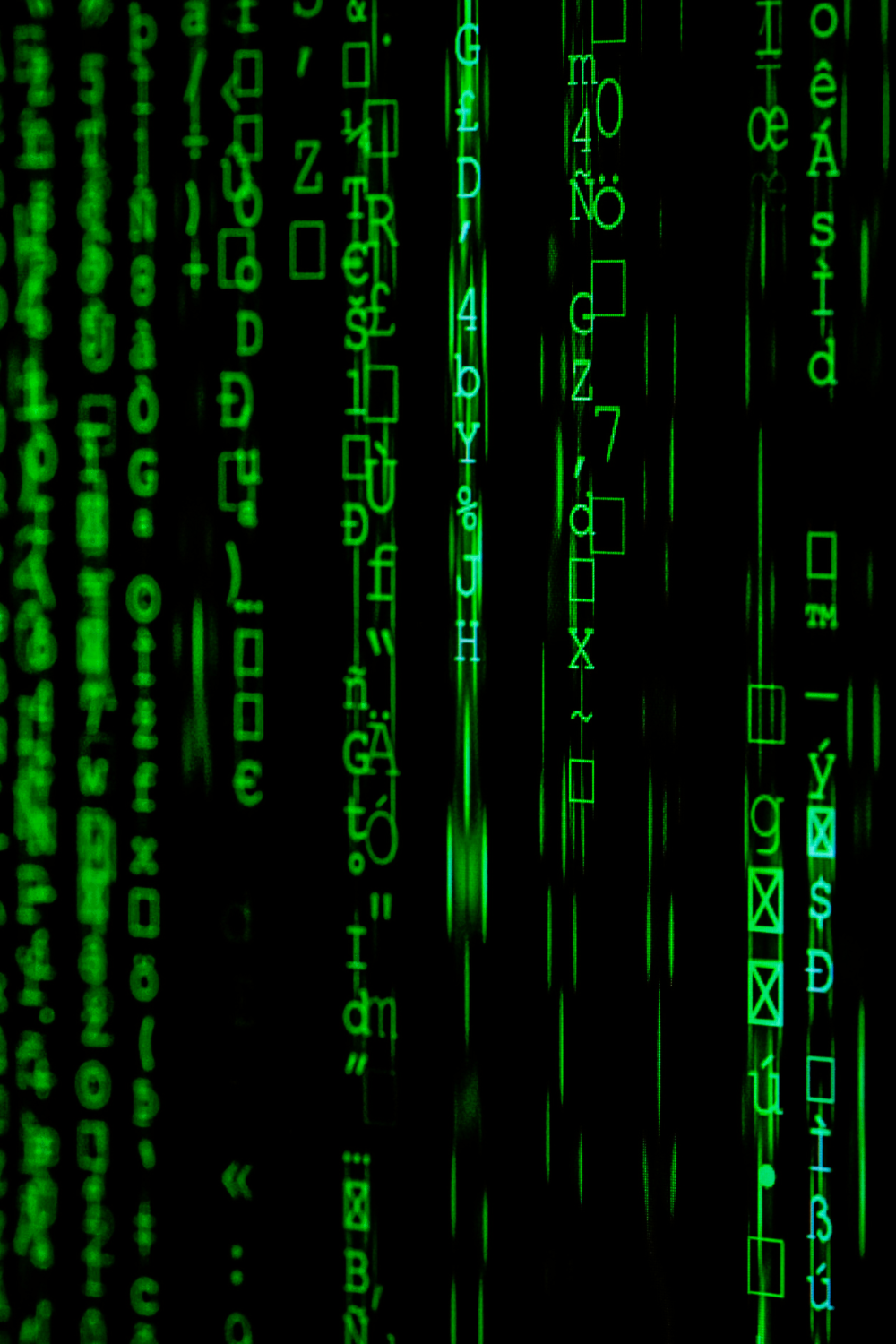 lines of code in green letters on a dark background symbolizing technology