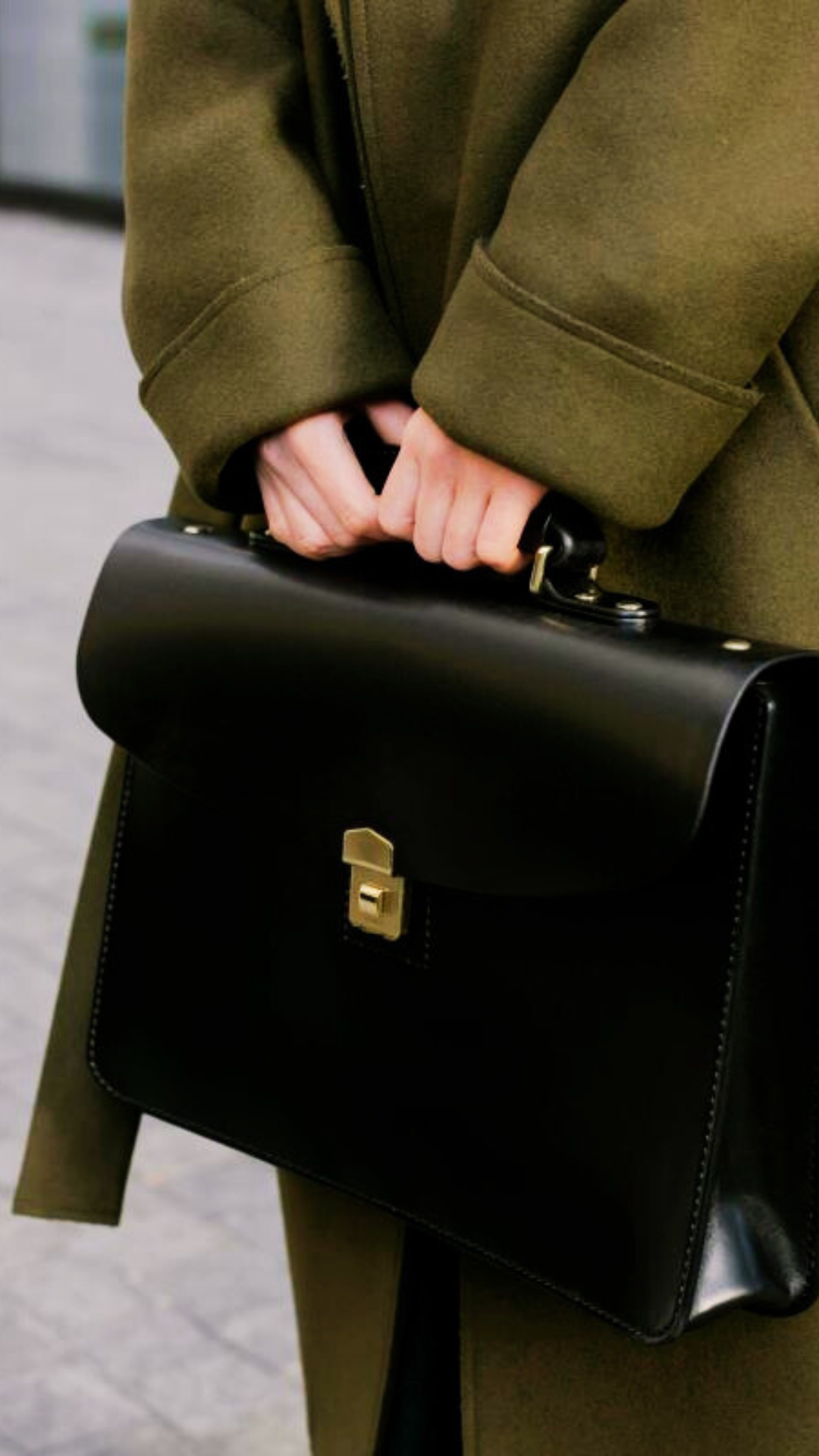 A professional woman holding a briefcase