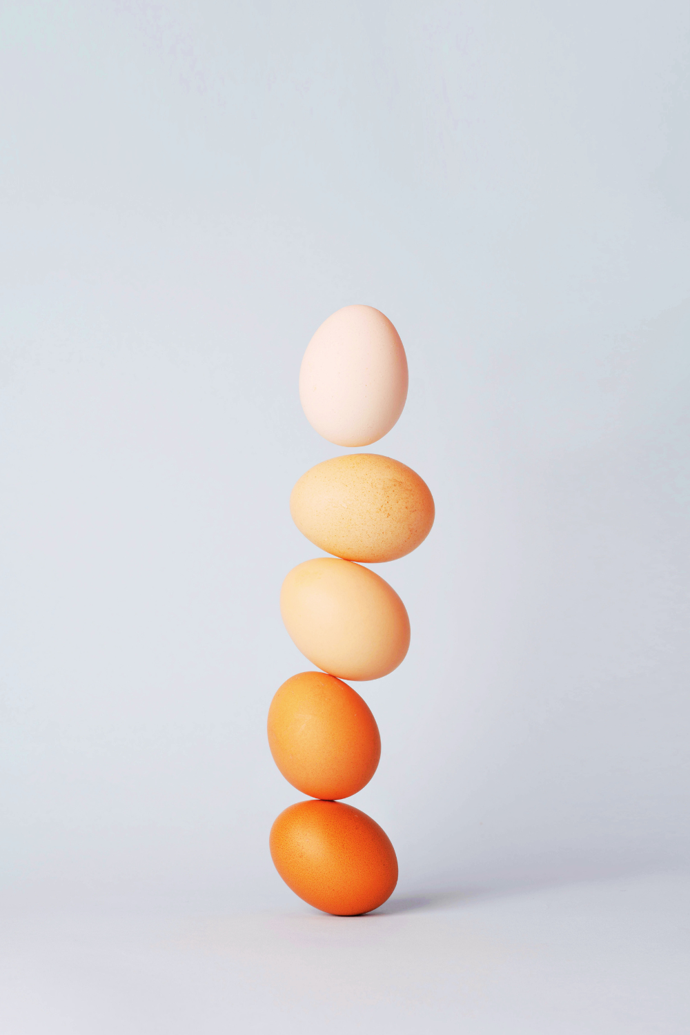 Five eggs stacked neatly on top of one another - symbolizing vitality and nutrition