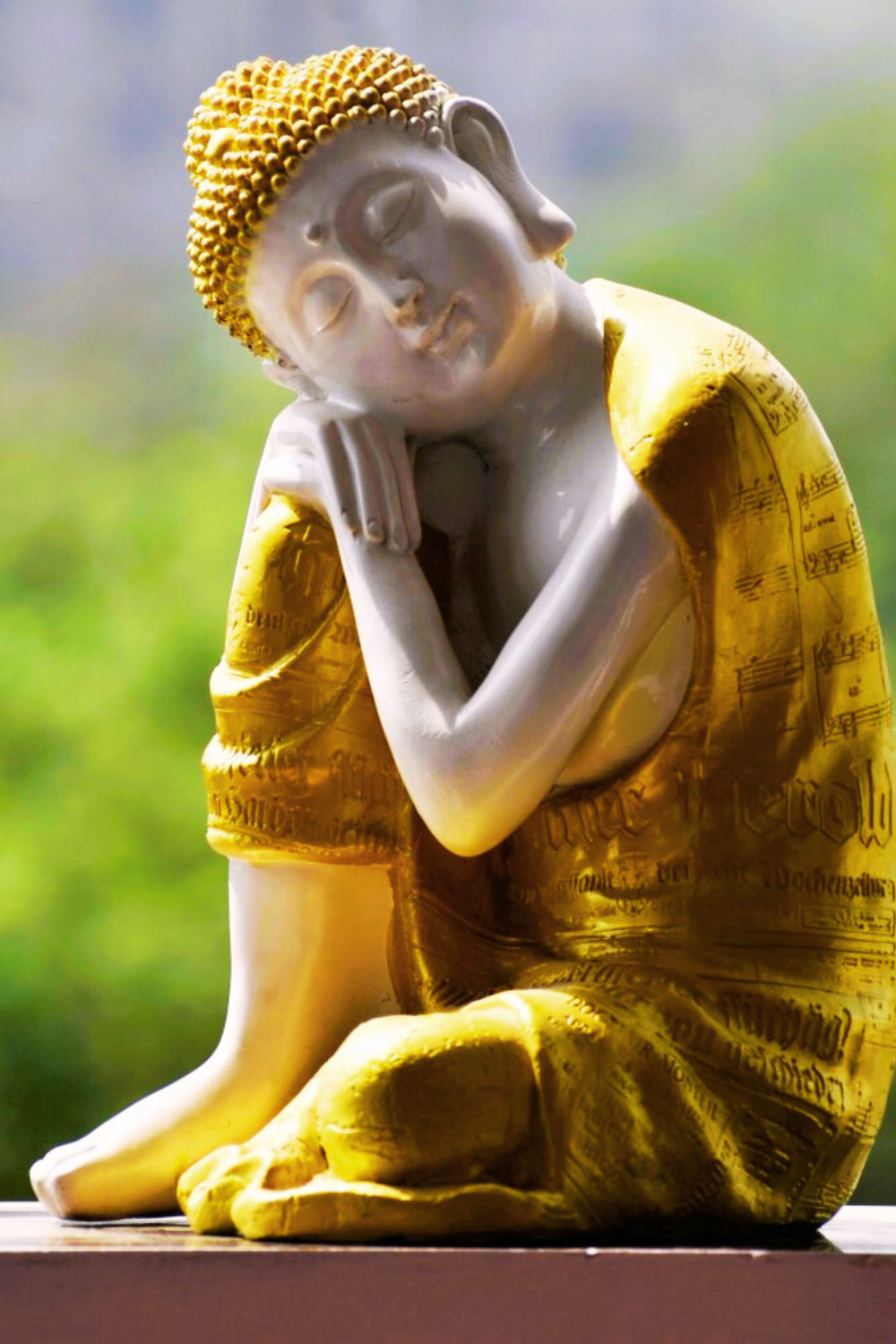 Buddha in golden tone symbolizing healing and spirituality