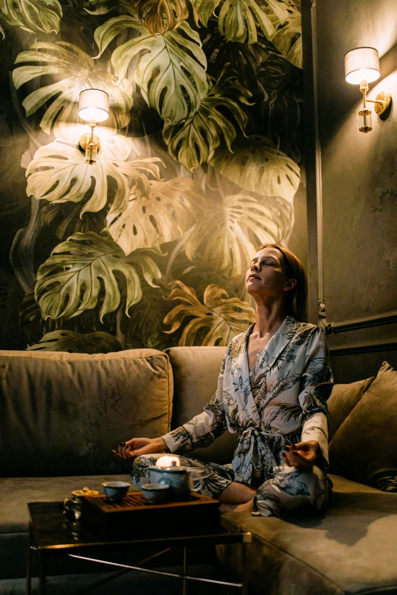 Self-care ritual – a woman practicing a hand mudra